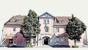 Außenaufnahme von Altes Brauhaus Königslutter mit rosafarbener Fassade und Bäumen